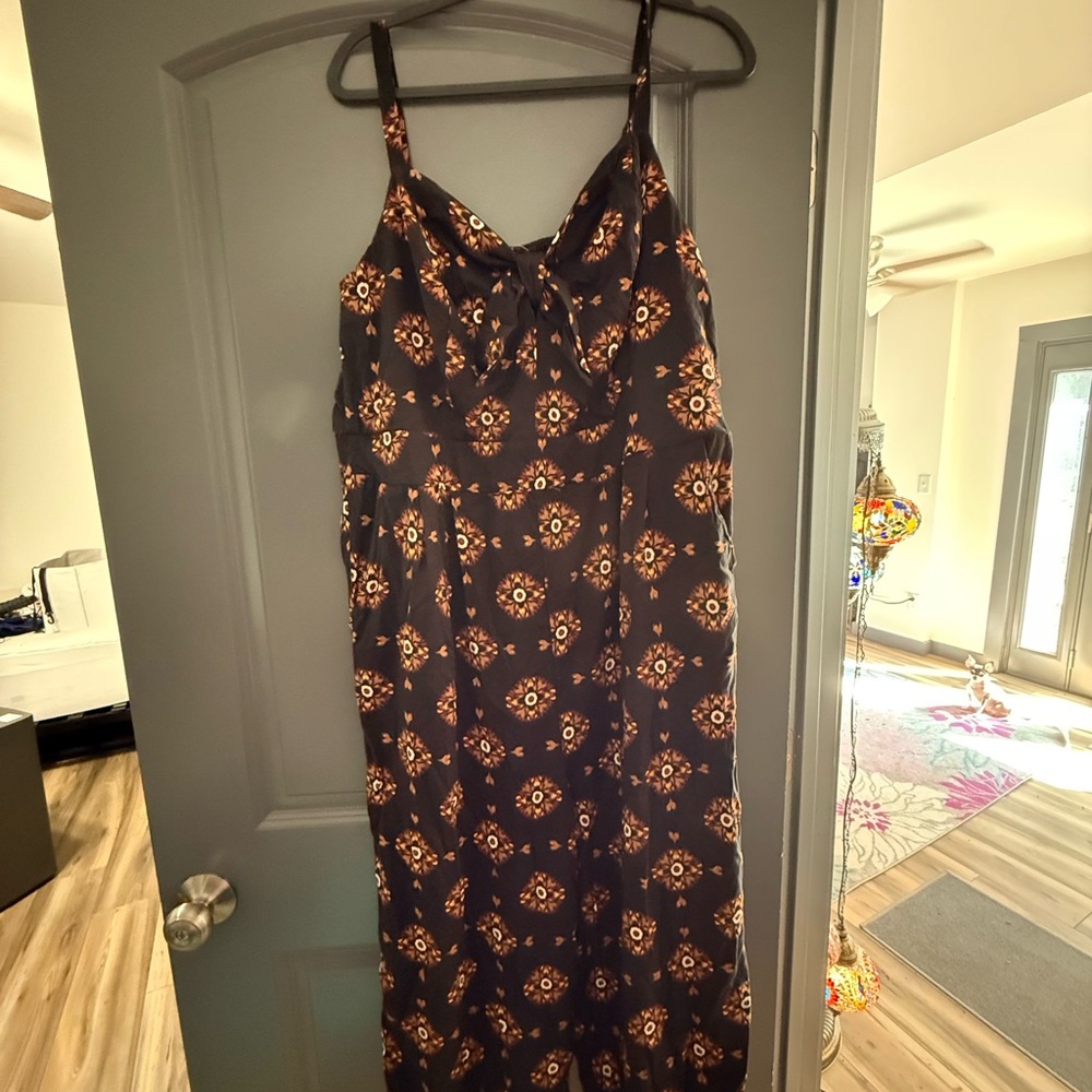 Torrid Black and Orange Patterned Jumpsuit
